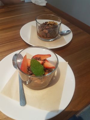 Vegan chocolate chia seed pudding. Sweetened naturally with date puree topped with either nuts or fruits.  at SLOW Plant Based Cafe in Koshigaya
