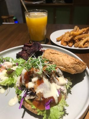 Messy Chick'n Burger and sweet potato fries at Burgreens - Menteng in Jakarta