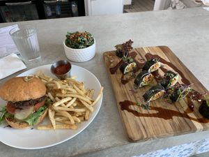 Mushroom walnut burger and vegan sushi. The burger is one of the best vegan burgers I ever had   at Verdine in Houston