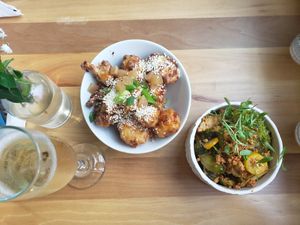 Orange Cauliflower & kimchi brussels at Verdine in Houston