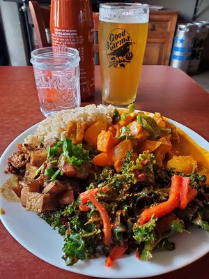 Red curry, jerk chicken and kale salad at Good Karma Artisan Ales & Cafe in San Jose