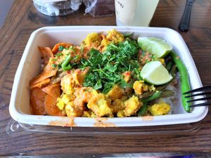 Chef curry with crispy tofu at Grainmaker in Boston