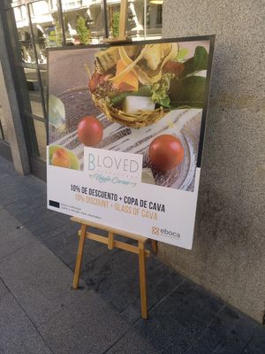 Sign at the pavement at BLoved Veggie Corner in Madrid