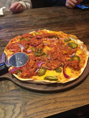 Vegan Border Stop Pizza: vegan chilli con carne, jalapenos, red onions at Monterey Jack's in Glasgow