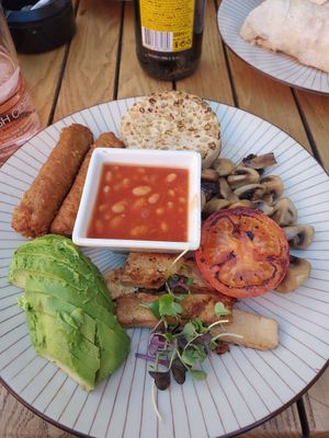 Tofu, avacado, vegan sausage, crumpet, beans, mushrooms & tomato. at Flaherty's in Barcelona