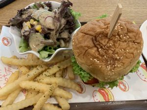 Hawaiian burger with a salad and French fries  at Green Ba - Somerset in Central Singapore