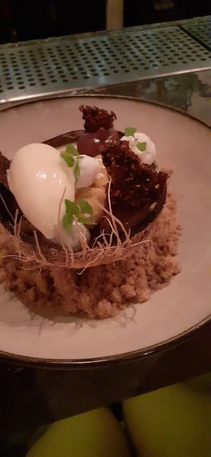 Toetje kokosijs en ananas at Mosa in Willemstad