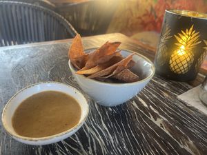 Freshly made tortilla chips with accompanying sweet dipping sauce  at Mosa in Willemstad