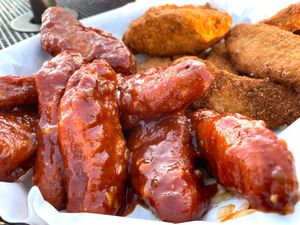 We ordered vegan wings - spicy dry rub (six pepper combination) and spicy bbq 
(bbq with habanero relish). at Art's Pub in Lansing