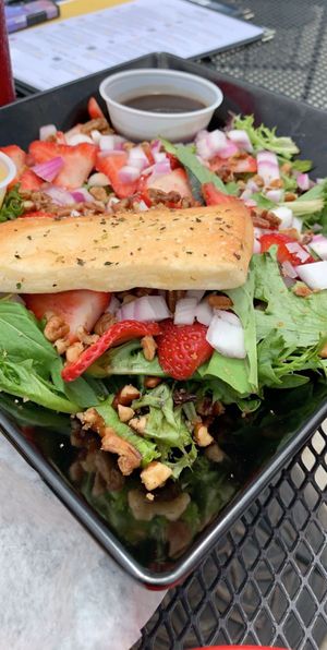 Strawberry Fields salad, get it with Italian dressing and no feta to make it vegan at Art's Pub in Lansing