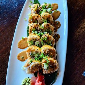 Green Peace Roll with Shitake, Bell Pepper, Tempura Asparagus, Avocado, Mixed Greens, & Sesame Ginger Soy at Conola Grill and Sushi in Metairie