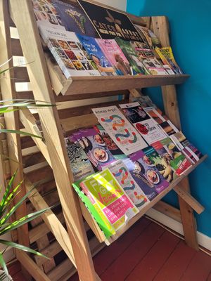 Inside the cafe are Flyer and booklets for vegan information and recipes at Catchacarrot Vegan in Ardfern