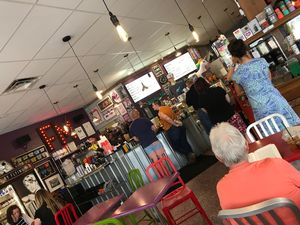 Tables, couches and a quirky fun gift shop inside at Flying M Coffee in Boise