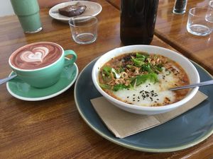 Mapo tofu congee with Red Velvet hot chocolate and choc mint hemp smoothie  at Boneless Vegetarian Cafe in Bermagui