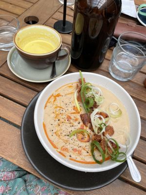 Cauliflower soup and turmeric latte   at Boneless Vegetarian Cafe in Bermagui