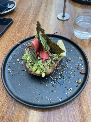 Smashed avocado with pickled radishes   at Boneless Vegetarian Cafe in Bermagui