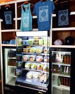 A variety of natural, organic grab-n-go dishes and juices are available daily.  at Liquid Life in Kamulea