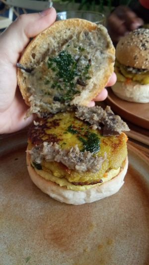 Sweet potato burger of the day filled with eggplant, lentils hummus and cilantro pesto at Gaïa Coffee House in Lyon