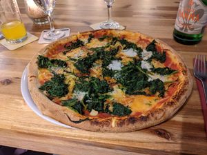 Pizza Spinat mit veganen Feta at Pizzeria Trattoria Sorrentino in Cologne