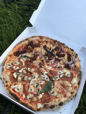 Delicious pizza. Half Salami Funghi half tuna onion at Pizzeria Trattoria Sorrentino in Cologne