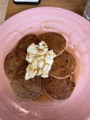 Pancakes with syrup and butter 💖 at Eqvilibrivm Cafe in Barcelona