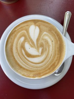 Latte with oat milk at Eqvilibrivm Cafe in Barcelona