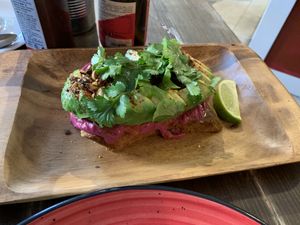 Avocado toast with beetroot hummus at Eqvilibrivm Cafe in Barcelona