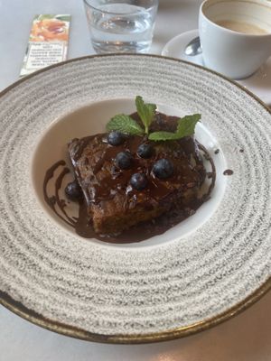 Carrot cake with chocolate drizzle   at Eqvilibrivm Cafe in Barcelona