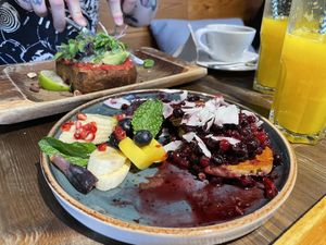 Pancakes with fruits  at Eqvilibrivm Cafe in Barcelona