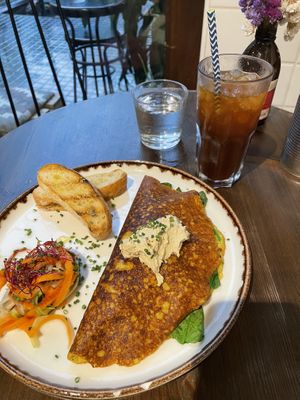 Tofu omelet and cold brew coffee  at Eqvilibrivm Cafe in Barcelona