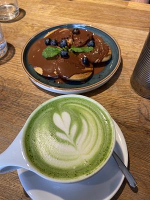 Chocolate pancakes and matcha latte  at Eqvilibrivm Cafe in Barcelona