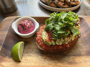Avocado Toast with Beetroot Hummus  at Eqvilibrivm Cafe in Barcelona