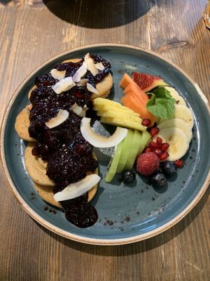 Fresh fruit en berry compote pancakes; would not recommend   at Eqvilibrivm Cafe in Barcelona
