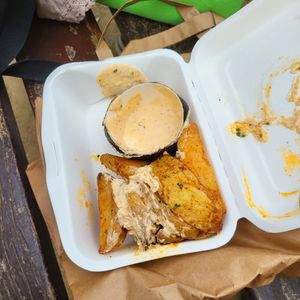 Patatas bravas after carrying them around for a while 😅 at Eqvilibrivm Cafe in Barcelona