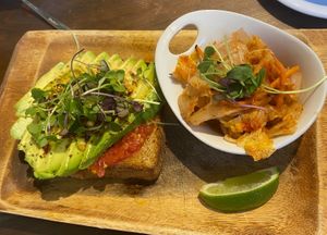 Avo toast + kimchii  at Eqvilibrivm Cafe in Barcelona