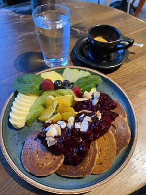 Pancakes w/fresh fruit   at Eqvilibrivm Cafe in Barcelona