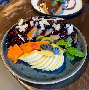 Fruit pancakes + extra portion of fruit  at Eqvilibrivm Cafe in Barcelona