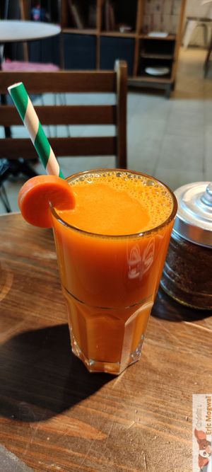 Orange sunrise juice, orange, carrot, ginger, and turmeric at Eqvilibrivm Cafe in Barcelona