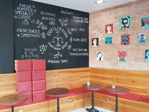 interior (just closed - hence cushions all stacked) at Eqvilibrivm Cafe in Barcelona