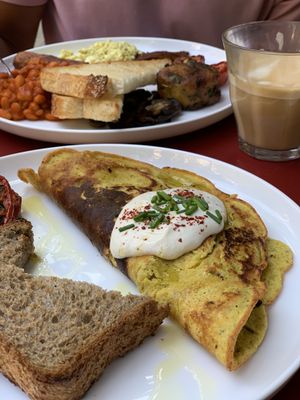 Chickpea omelette and English breakfast with oat lattes  at Eqvilibrivm Cafe in Barcelona