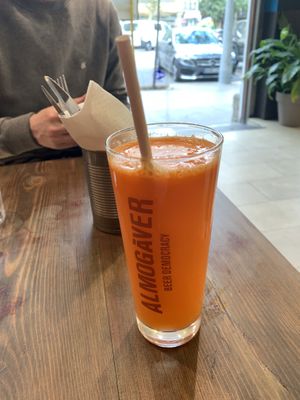 Amazing orange fruit drink with carrot, orange and ginger at Eqvilibrivm Cafe in Barcelona