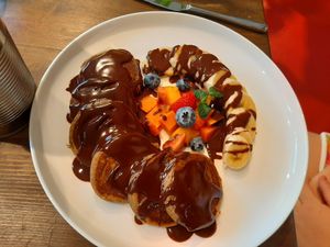 Buckwheat pancakes with chocolate and banana at Eqvilibrivm Cafe in Barcelona