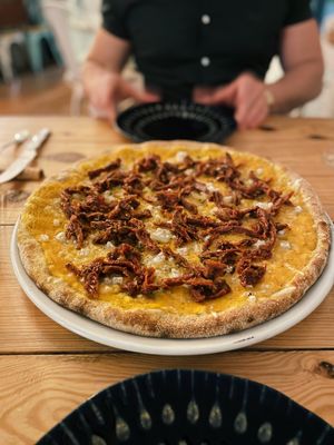 Pizza with a pumpkin base and vegan cheese. P e r f e c t.  at Pisco in Vila Do Bispo