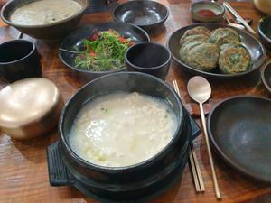 Tofu stew with side dishes at Babiboyak in Jeju