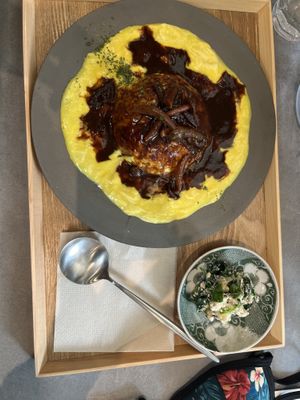 Yuba “eggs” and a side of whimsical vegetables  at Mumokuteki Vegan Cafe in Kyoto