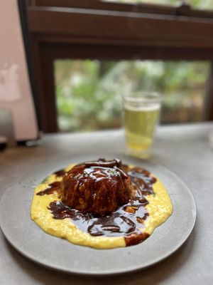Yuba ‘egg’ with Demi Sauce on Dice  at Mumokuteki Vegan Cafe in Kyoto