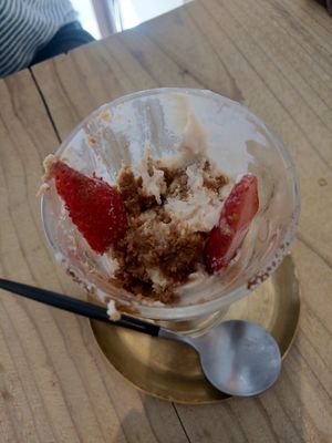 Unfinished remains with frozen fruit and partly frozen cake :( at Mumokuteki Vegan Cafe in Kyoto