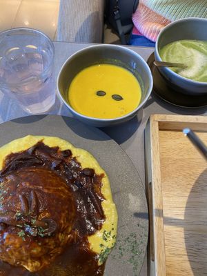 Pumpkin soup (half), Tofu skin omurice. Both vegan, delicious. at Mumokuteki Vegan Cafe in Kyoto