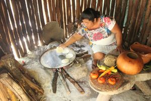 fresh hand made corn tortillas by mayan woman. at IX CAT IK in Valladolid