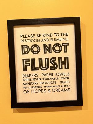 Funny bathroom sign  at Lovebirds Donuts in Kittery